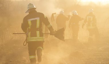 Firefighters work on a wildfire.