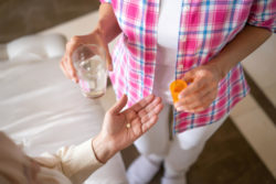 Woman taking medication