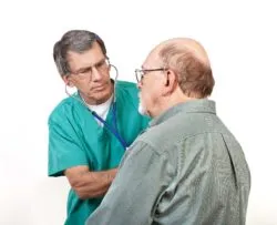doctor checking man for asbestosis