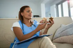 Doctor looks at prescription bottles