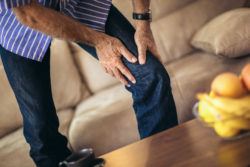 Elderly man with knee problems
