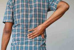 Man experiencing hip pain