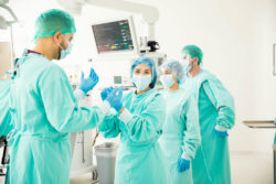 Surgeons getting ready in an operating room
