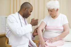 Woman getting vaccination