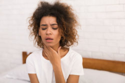 A woman with heartburn