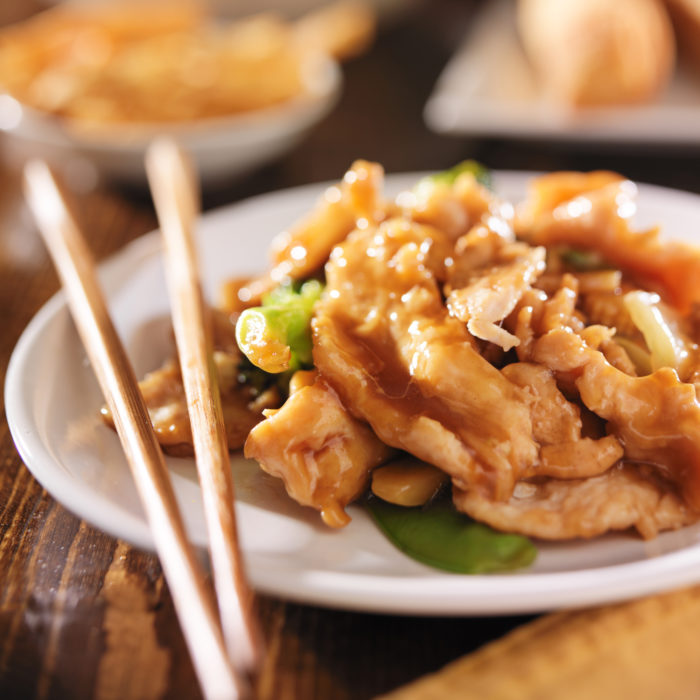 Chinese food being served at P.F. Chang's restaurant