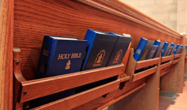 Church pews with bibles
