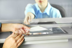 Close up of bank teller