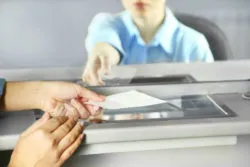 Close up of bank teller