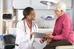 A doctor talks with a patient.