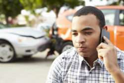 Driver making a call after a car accident