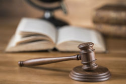 Gavel next to law book