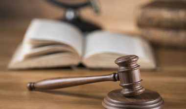 Gavel next to law book