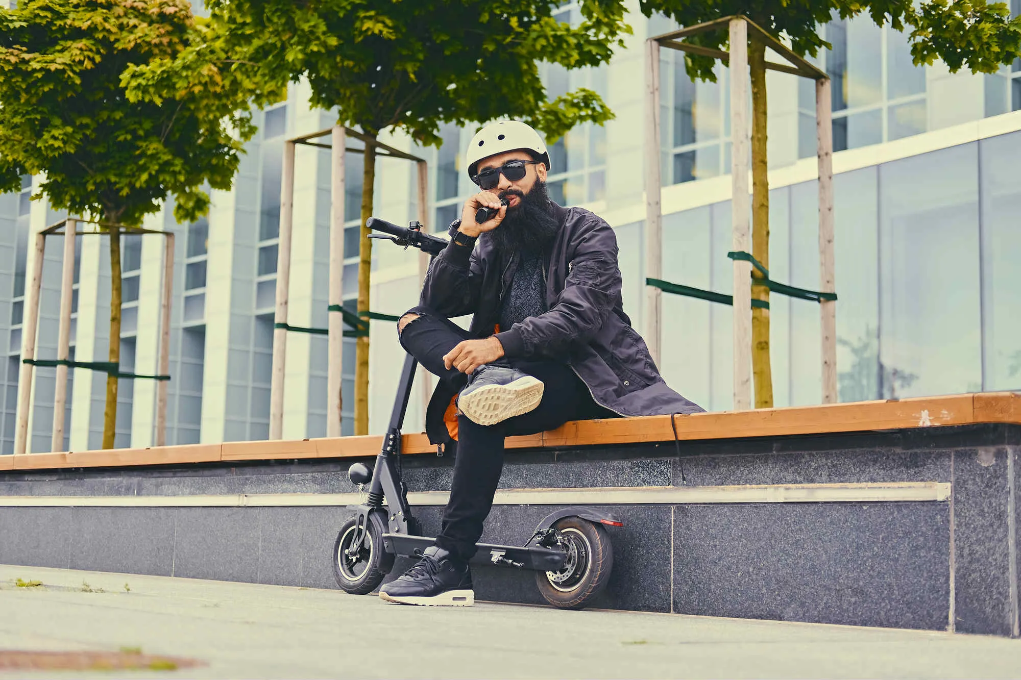 Man with scooter vaping