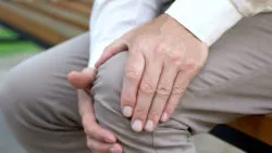 Man with sore knee