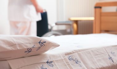 Nursing home bed and wheelchair
