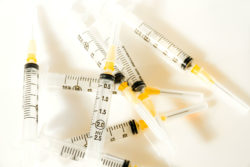 Syringes on a white background