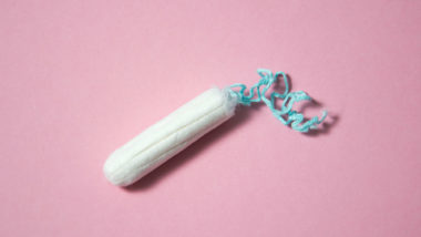 Tampon on pink background