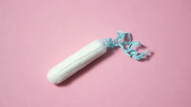 Tampon on pink background