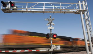 Train speeding through railroad crossing