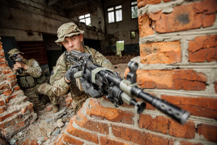 Troops conduct a military operation in city