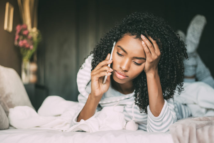 woman receiving an unwanted phone call from Nationwide Mutual Insurance