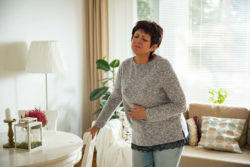 Woman with stomach pain