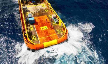 Workers at sea on a barge