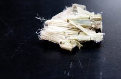 Asbestos fibers on black background