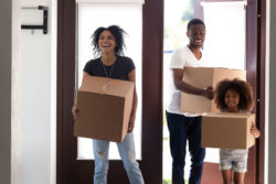 Excited family with moving boxes