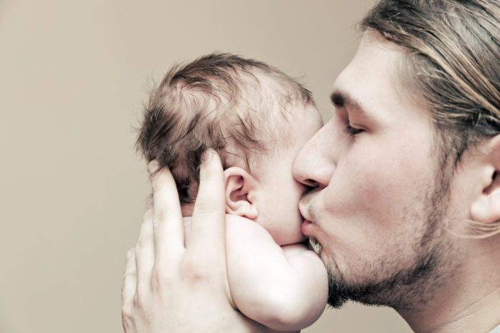 JPMorgan male employee with his new baby