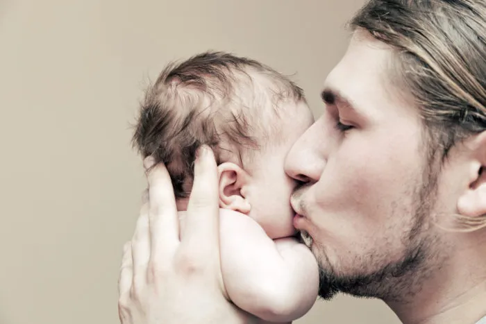 JPMorgan male employee with his new baby