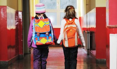 Girls walking in school