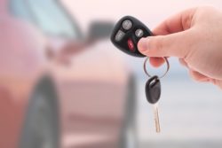 Keys to a red rental car