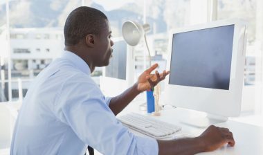 Man frustrated with slow computer