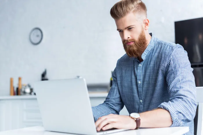 man working ASUS laptop