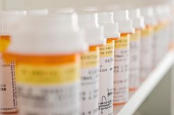 prescription bottles in a row