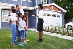 Real estate agent shows home