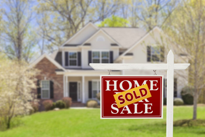Sold sign on house listed by Keller Williams