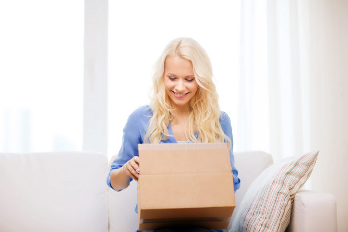 woman opening up singles swag box