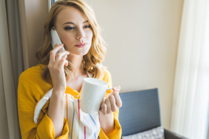 woman receiving phone call from Savers