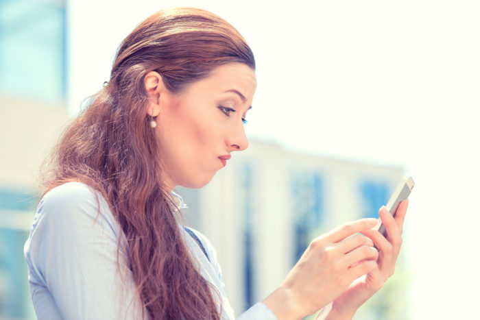 woman receiving unwanted phone call from Sagent Lending