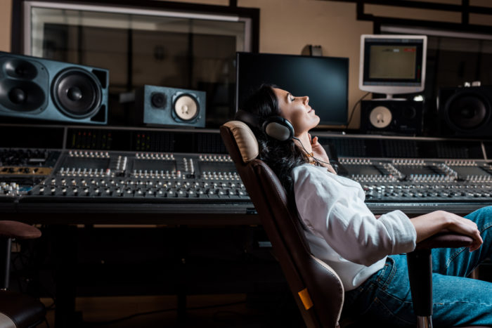 music being recorded in studio to be played on spotify