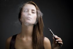 Woman smoking ecigarette