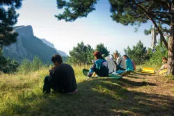 While camping, teens camping and discussing childhood sexual abuse