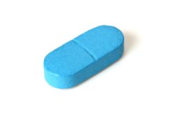 blue pill on white background
