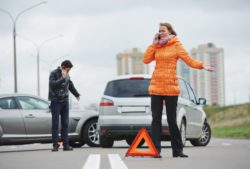 Car accident with upset drivers on phones