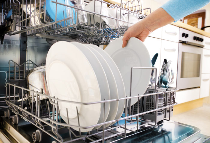 open dishwasher with clean dishes