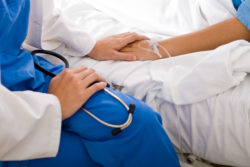 Doctor telling patient her hernia mesh is infected.
