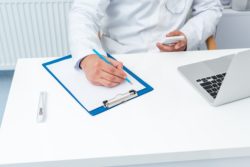 doctor with paperwork